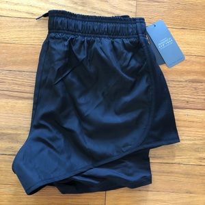 Black athletic shorts with spandex shorts inside